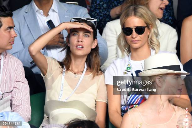 Alexa Chung and Poppy Delevingne attend day seven of the Wimbledon Tennis Championships at the All England Lawn Tennis and Croquet Club on July 9,...