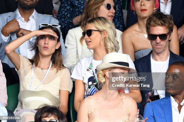 Alexa Chung, Poppy Delevingne and her husband James Cook attend day seven of the Wimbledon Tennis Championships at the All England Lawn Tennis and...