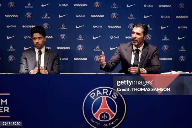 S Qatari president Nasser Al-Khelaifi listens as Italian goalkeeper Gianluigi Buffon speaks during a press conference on July 9, 2018 at the Parc des...