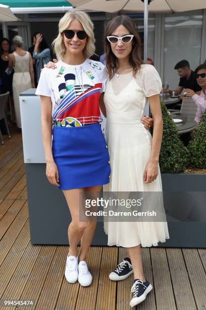 Poppy Delevingne and Alexa Chung attend the Polo Ralph Lauren and British Vogue Wimbledon day on July 9, 2018 in London, England.