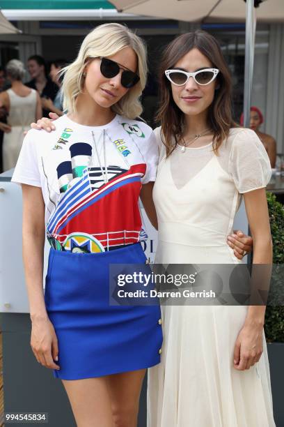 Poppy Delevingne and Alexa Chung attend the Polo Ralph Lauren and British Vogue Wimbledon day on July 9, 2018 in London, England.