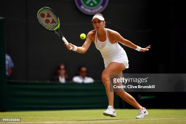 Belinda Bencic of Switzerland plays a forehand against Angelique Kerber of Germany during their Ladies' Singles fourth round match on day seven of...
