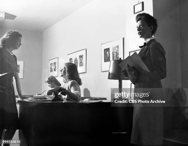 Headquarters. 18th floor reception desk, 485 Madison Avenue, New York, NY. August 8, 1944.