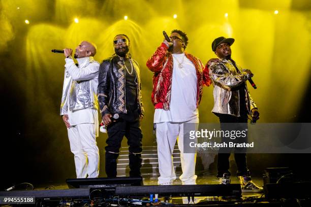 Teddy Riley and Dave Hollister of Blackstreet perform onstage during the 2018 Essence Festival at the Mercedes-Benz Superdome on July 8, 2018 in New...