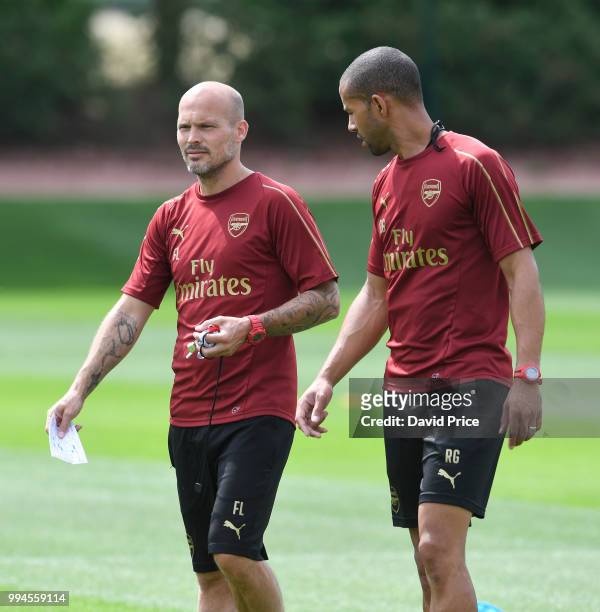 Freddie Ljungberg the Arsenal U23 Head Coach chats to his assistant Ryan Garry during Arsenal U23 Training Session at London Colney on July 9, 2018...