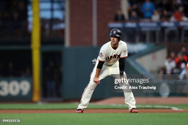 Buster Posey of the San Francisco Giants takes a lead off first base during a game against the Colorado Rockies at AT&T Park on Wednesday, June 27,...