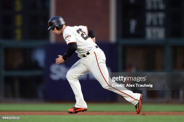 Buster Posey of the San Francisco Giants runs from first base during a game against the Colorado Rockies at AT&T Park on Wednesday, June 27, 2018 in...