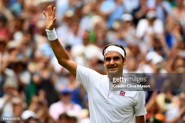 Roger Federer of Switzerland thanks the crowd after winning his Men's Singles fourth round match against Adrian Mannarino of France on day seven of...