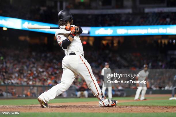 Brandon Crawford of the San Francisco Giants bats during a game against the Colorado Rockies at AT&T Park on Wednesday, June 27, 2018 in San...