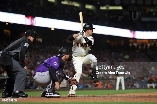 Buster Posey of the San Francisco Giants bats during a game against the Colorado Rockies at AT&T Park on Wednesday, June 27, 2018 in San Francisco,...