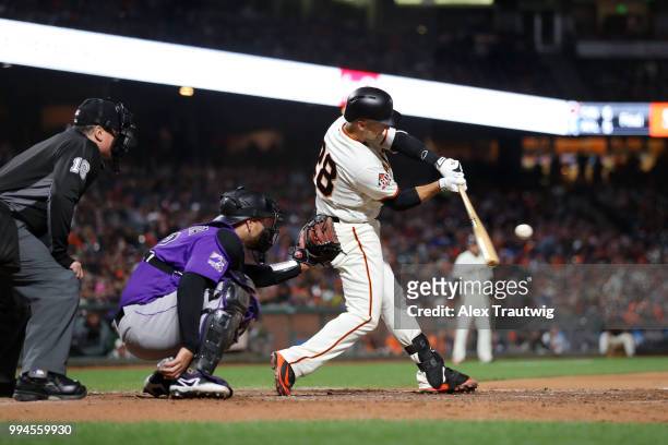 Buster Posey of the San Francisco Giants bats during a game against the Colorado Rockies at AT&T Park on Wednesday, June 27, 2018 in San Francisco,...