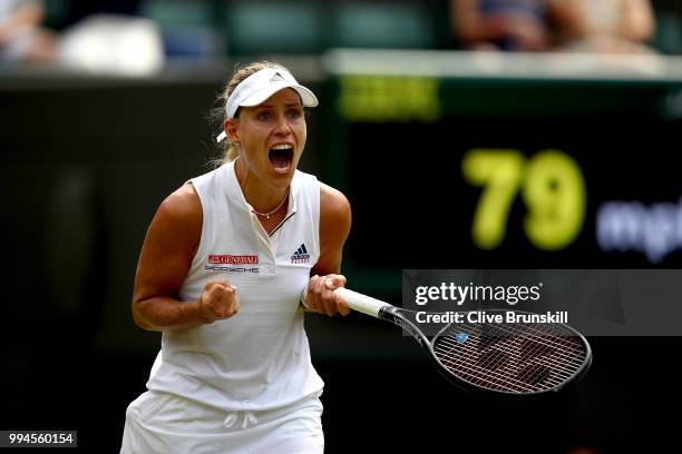 Angelique Kerber of Germany celebrates winning match point in her Ladies' Singles fourth round match against Belinda Bencic of Switzerland on day...