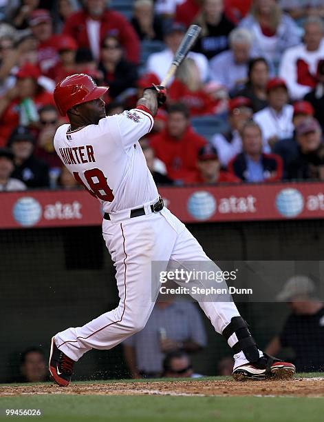 Torii Hunter of the Los Angeles Angels of Anaheim hits a three run home run in the sixth inning against the Cleveland Indians on April 28, 2010 at...