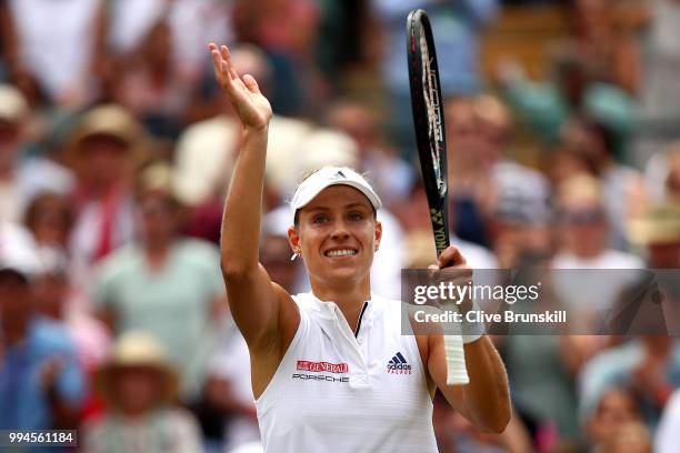 Angelique Kerber of Germany thanks the crowd after winning her Ladies' Singles fourth round match against Belinda Bencic of Switzerland on day seven...