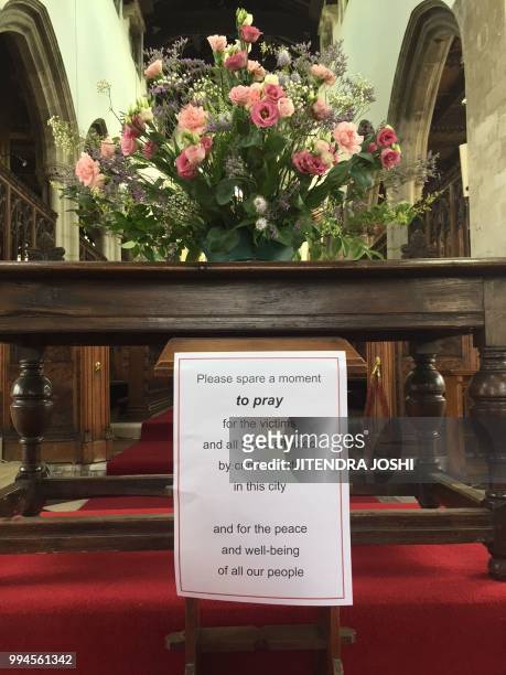 Picture shows a sign urging parishioners to pray for Dawn Sturgess and Charlie Rowley, the couple poisoned by contact with the nerve agent Novichok,...