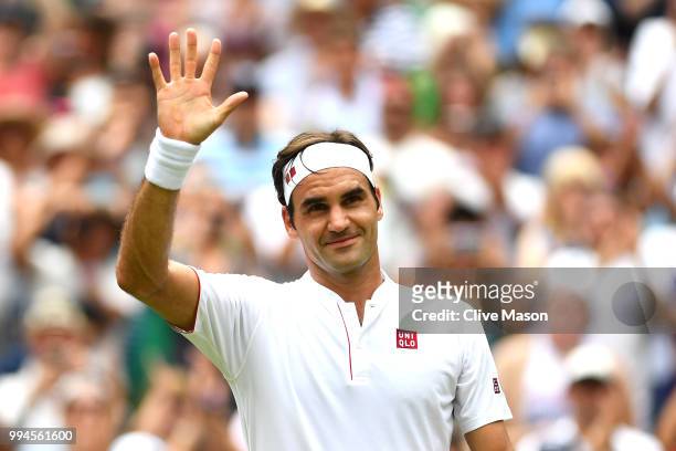Roger Federer of Switzerland thanks the crowd after winning his Men's Singles fourth round match against Adrian Mannarino of France on day seven of...
