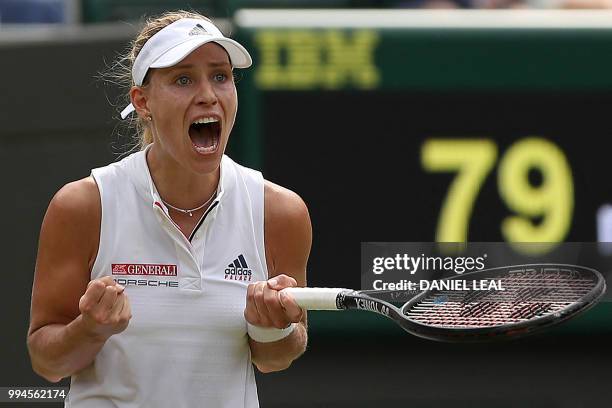 Germany's Angelique Kerber reacts after winning against Switzerland's Belinda Bencic during their women's singles fourth round match on the seventh...