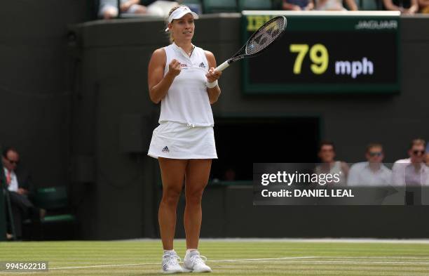 Germany's Angelique Kerber reacts after winning against Switzerland's Belinda Bencic during their women's singles fourth round match on the seventh...
