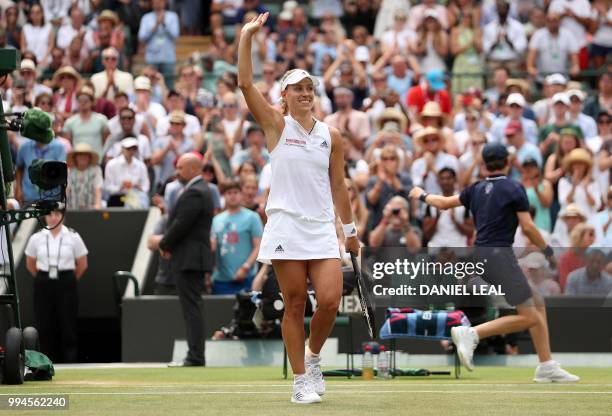 Germany's Angelique Kerber reacts after winning against Switzerland's Belinda Bencic during their women's singles fourth round match on the seventh...