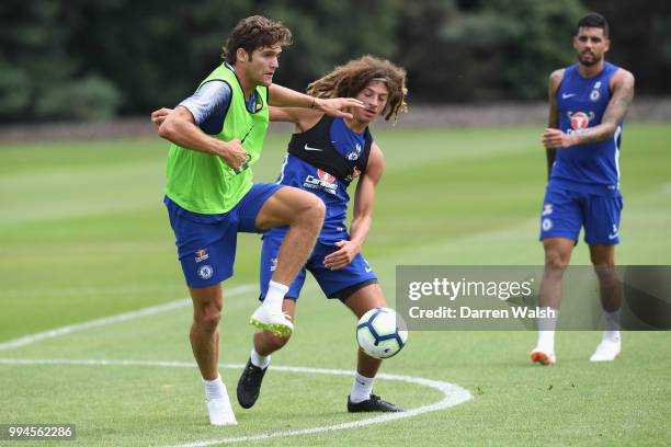 Ethan Ampadu and Marcos Alonso of Chelsea during a training session at Chelsea Training Ground on July 9, 2018 in Cobham, England.