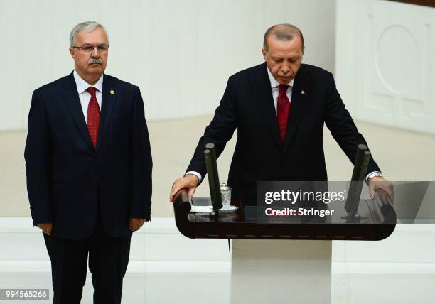 Turkey's President Recep Tayyip Erdogan receives his oath as he is sworns as Turkey's first Executive President at the Turkish parliament on July 9,...