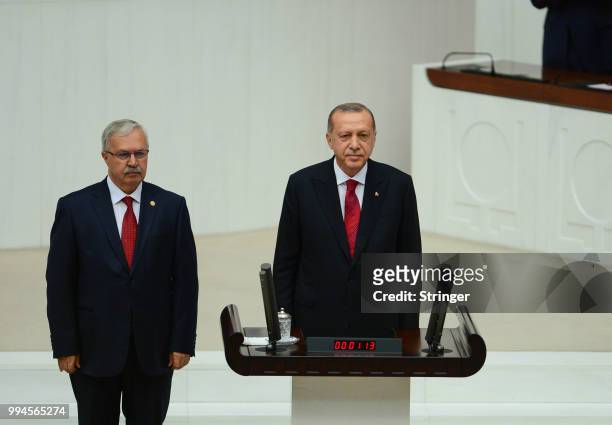 Turkey's President Recep Tayyip Erdogan receives his oath as he is sworns as Turkey's first Executive President at the Turkish parliament on July 9,...