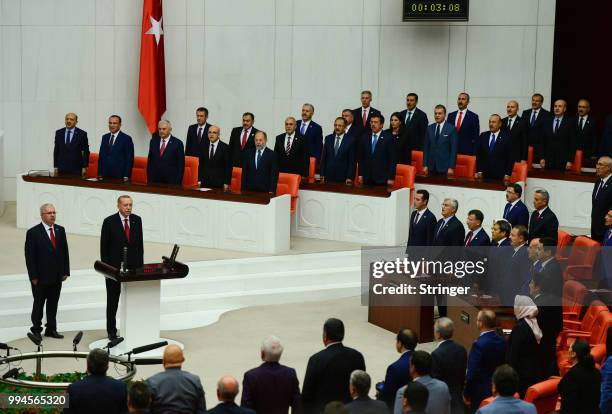 Turkey's President Recep Tayyip Erdogan receives his oath as he is sworns as Turkey's first Executive President at the Turkish parliament on July 9,...