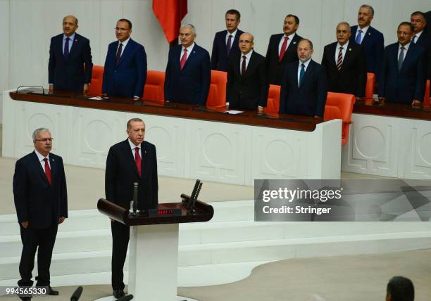 Turkey's President Recep Tayyip Erdogan receives his oath as he is sworns as Turkey's first Executive President at the Turkish parliament on July 9,...