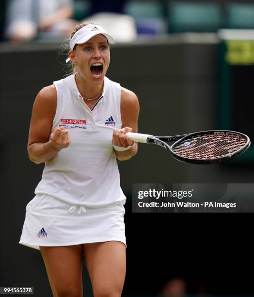 Angelique Kerber celebrates her win against Belinda Bencic on day seven of the Wimbledon Championships at the All England Lawn Tennis and Croquet...