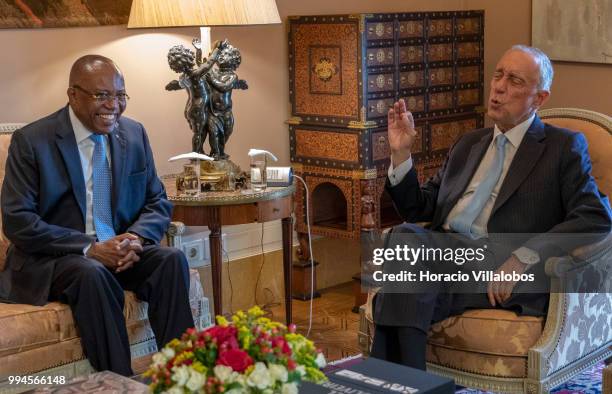 Foreign Minister of Angola Manuel Domingos Augusto and Portuguese President Marcelo Rebelo de Sousa share a laugh during their meeting in Belem...