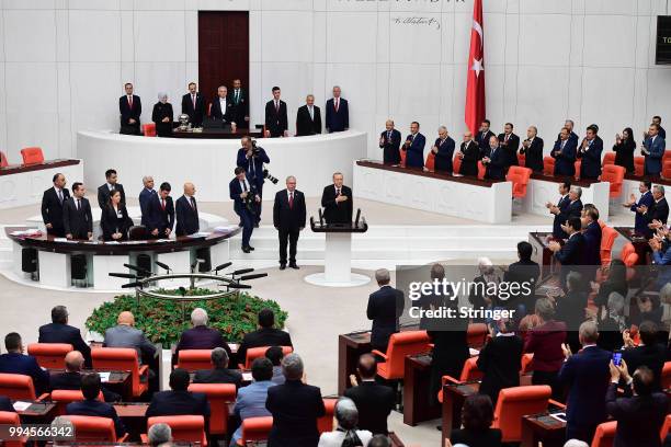 Turkey's President Recep Tayyip Erdogan receives his oath as he is sworns as Turkey's first Executive President at the Turkish parliament on July 9,...