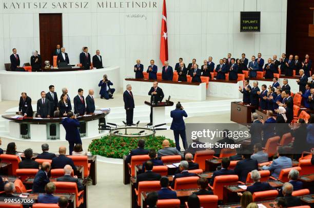 Turkey's President Recep Tayyip Erdogan receives his oath as he is sworns as Turkey's first Executive President at the Turkish parliament on July 9,...