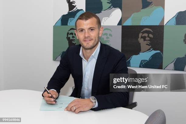 West Ham United new signing Jack Wilshere poses while he signs on July 9, 2018 in London, United Kingdom.