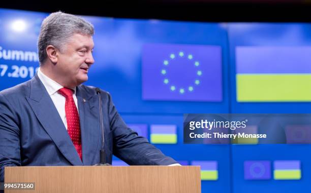 Ukrainian President Petro Oleksiyovych Poroshenko talks to the media at the end of the European Union/Ukraine Summit at the EU Council headquarters...