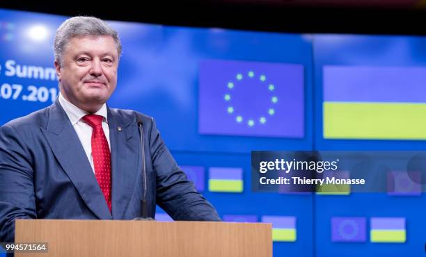 Ukrainian President Petro Oleksiyovych Poroshenko talks to the media at the end of the European Union/Ukraine Summit at the EU Council headquarters...