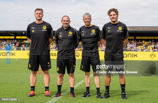 Matthias Kleinsteiger , assistant coach Manfred Stefes , Manager Lucien Favre and assistant coach Edin Terzic of Borussia Dortmund during Borussia...