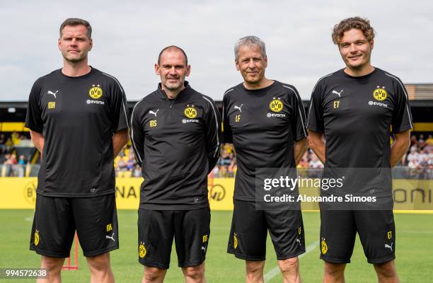 Matthias Kleinsteiger , assistant coach Manfred Stefes , Manager Lucien Favre and assistant coach Edin Terzic of Borussia Dortmund during Borussia...