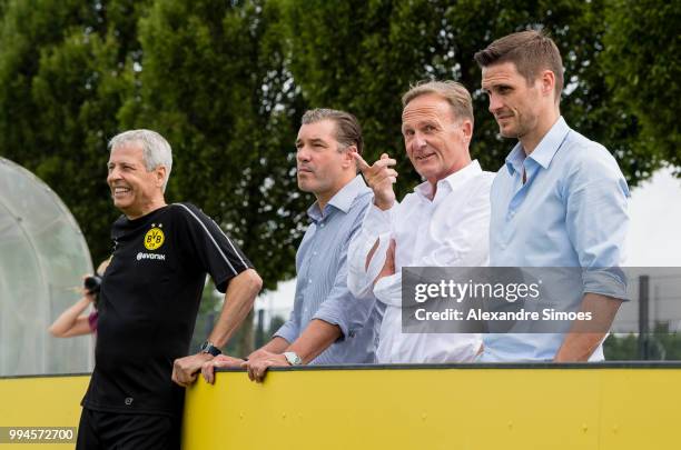 Manager Lucien Favre, Michael Zorc , Hans-Joachim Watzke and Sebastian Kehl during Borussia Dortmund's training session on July 9, 2018 in Dortmund,...