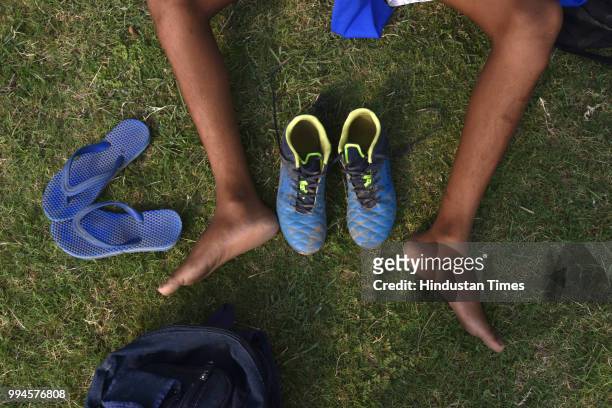 Football boots of a M2M club player is seen during practice in a park at Ghamroj Village on June 27, 2018 near Gurugram, India. Once a cricket crazy...