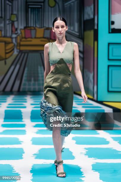 July 09: A model showcases designs by Rata Wong Hgan Chun from School of Continuing and Professional Studies, The Chinese University of Hong Kong...