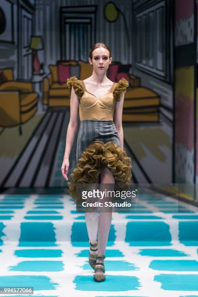 July 09: A model showcases designs by Rata Wong Hgan Chun from School of Continuing and Professional Studies, The Chinese University of Hong Kong...