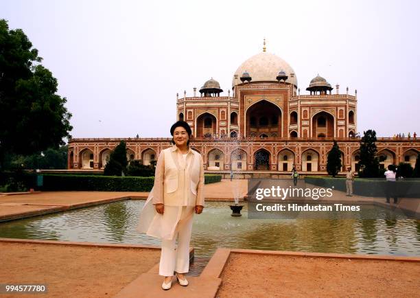 South Korean first lady Kim Jung-sook poses for photographers at 16th century Humayun's Tomb on July 9, 2018 in New Delhi, India. South Korean...