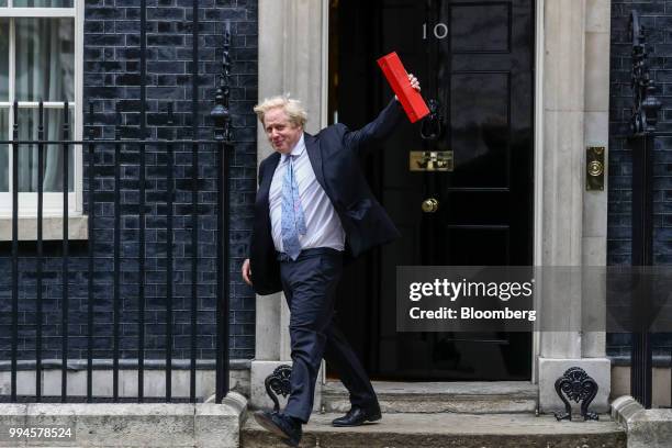 Boris Johnson, U.K. Foreign secretary, leaves after attending a meeting of cabinet minsters at number 10 Downing Street in London, U.K., on Tuesday,...