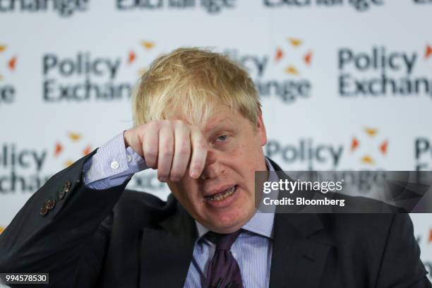 Boris Johnson, U.K. Foreign secretary, wipes his forehead as he delivers a speech in London, U.K., on Wednesday, Feb. 14, 2018. Johnson resigned from...