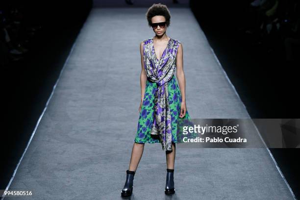 Model walks the runway at The Roberto Torretta show during the Mercedes-Benz Fashion Week Madrid Spring/Summer 2019 at IFEMA on July 9, 2018 in...