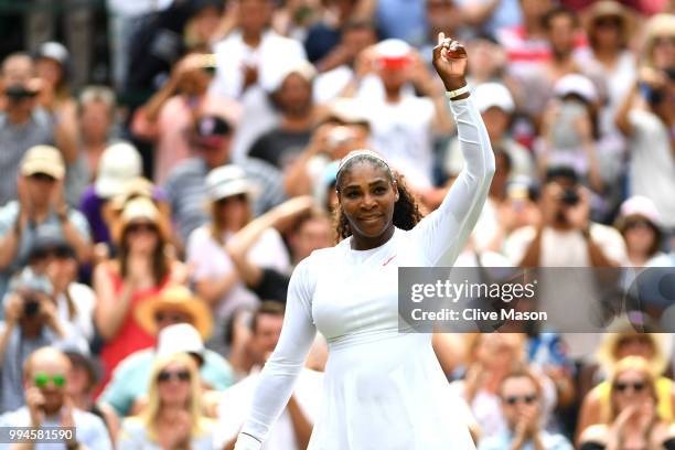 Serena Williams of the United States celebrates winning her Ladies' Singles fourth round match against Evgeniya Rodina of Russia on day seven of the...