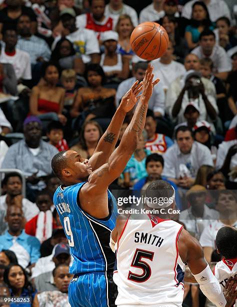 Rashard Lewis of the Orlando Magic against Josh Smith of the Atlanta Hawks during Game Three of the Eastern Conference Semifinals during the 2010 NBA...