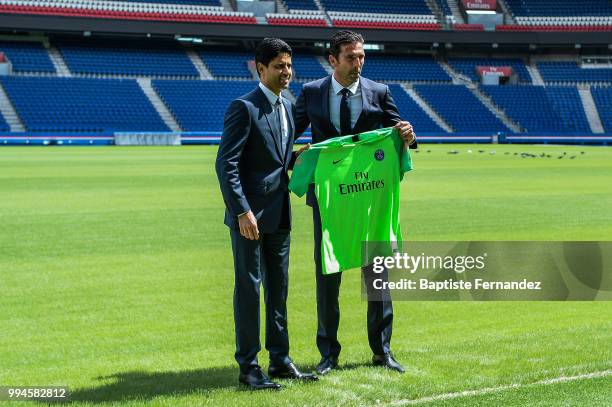 President of Paris Saint Germain Nasser Al Khelaifi and Gianluigi Buffon new signing player of Paris Saint Germain during Press Conference Paris...