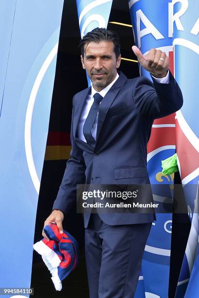 Gianluigi Buffon poses after signing with the Paris Saint-Germain Football Club at Parc des Princes on July 9, 2018 in Paris, France. Buffon signed...