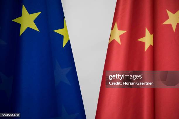 The flags of China and the European Union are pictured during the meeting of German Chancellor Angela Merkel and Li Keqiang , Prime Minister of...